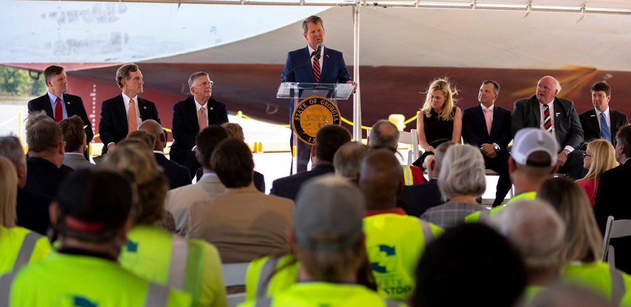 Georgia Governor Brian Kemp addresses an audience