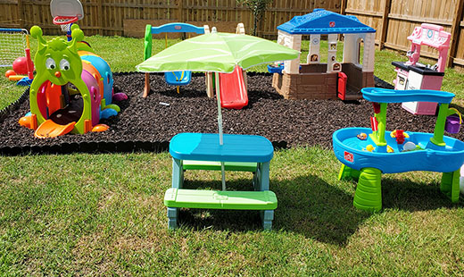 Outdoor playground with plastic toys for small children