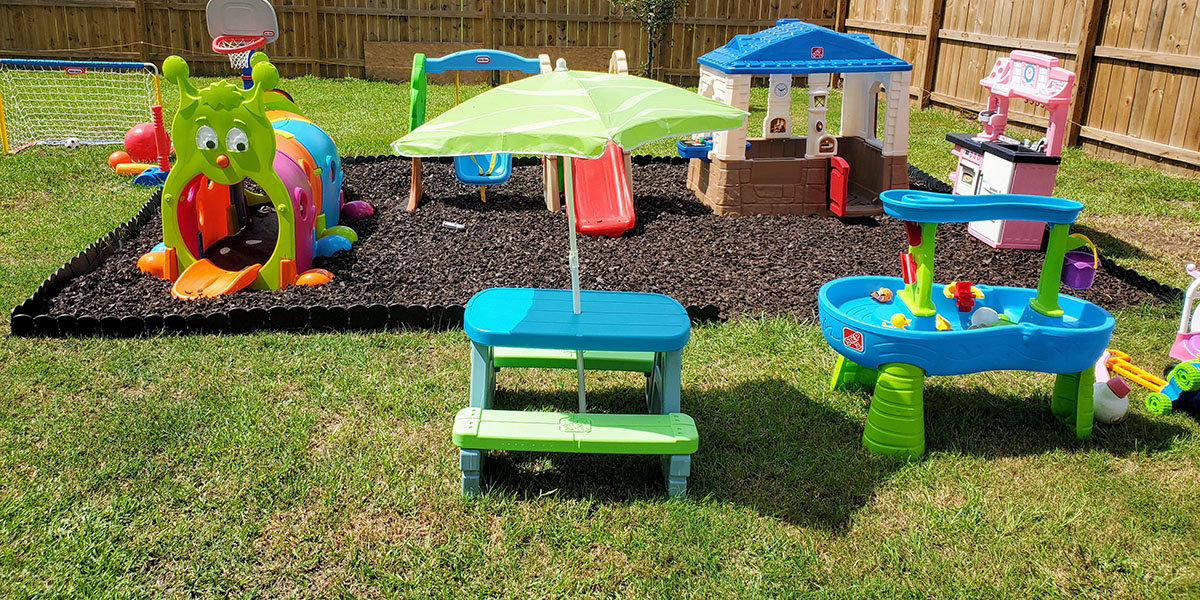 Outdoor playground with plastic toys for small children