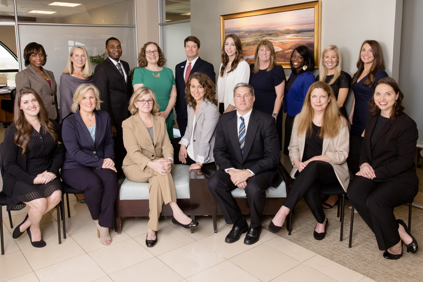 Office personnel posing for a group photo